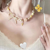 Beaded Star Bow Charm Necklace – Cream Yellow Bow